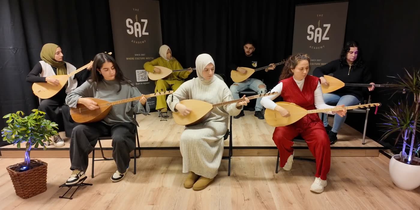 Students of The Saz Academy playing bağlama together